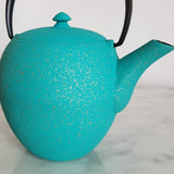 Théière en fonte bleu turquoise