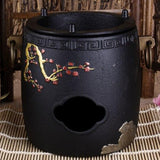 Chauffe Théière <br>en Fonte