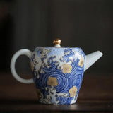théière céramique bleue et blanche