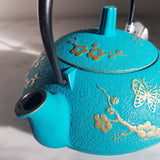 Théière en Fonte Turquoise <br> Iwachu Papillon Cho 600ml