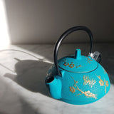 Théière en fonte bleue turquoise