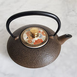 Théière en Fonte Couvercle Porcelaine