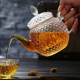 Belle théière en verre