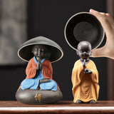 Bouddha en argile avec chapeau filtre