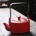 Théière en céramique rouge