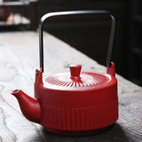 Théière en céramique rouge