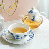théière solitaire verre et tasse porcelaine