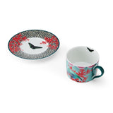 Tasse et soucoupe en Porcelaine