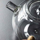 The side glass boiling teapot is high temperature resistant and thickened filter brewing teapot walnut tea warmer kettle